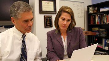 Pete Minneci, MD and Kate Deans, MD of Nationwide Children`s Hospital look over a study they authored that found 95 percent of children who were hospitalized for uncomplicated appendicitis could be successfully treated with antibiotics and sent home without undergoing traditional surgery.